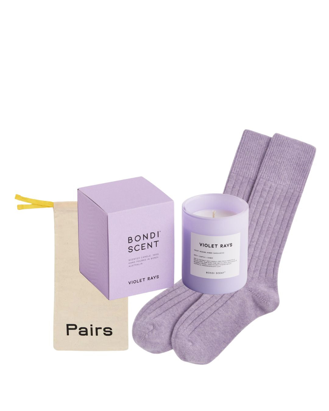 Lavender socks, candle, and packaging on a white background