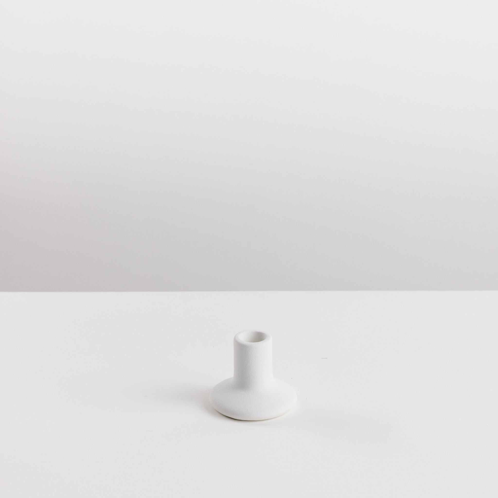 Small Bondi Scent taper candle holder on white background