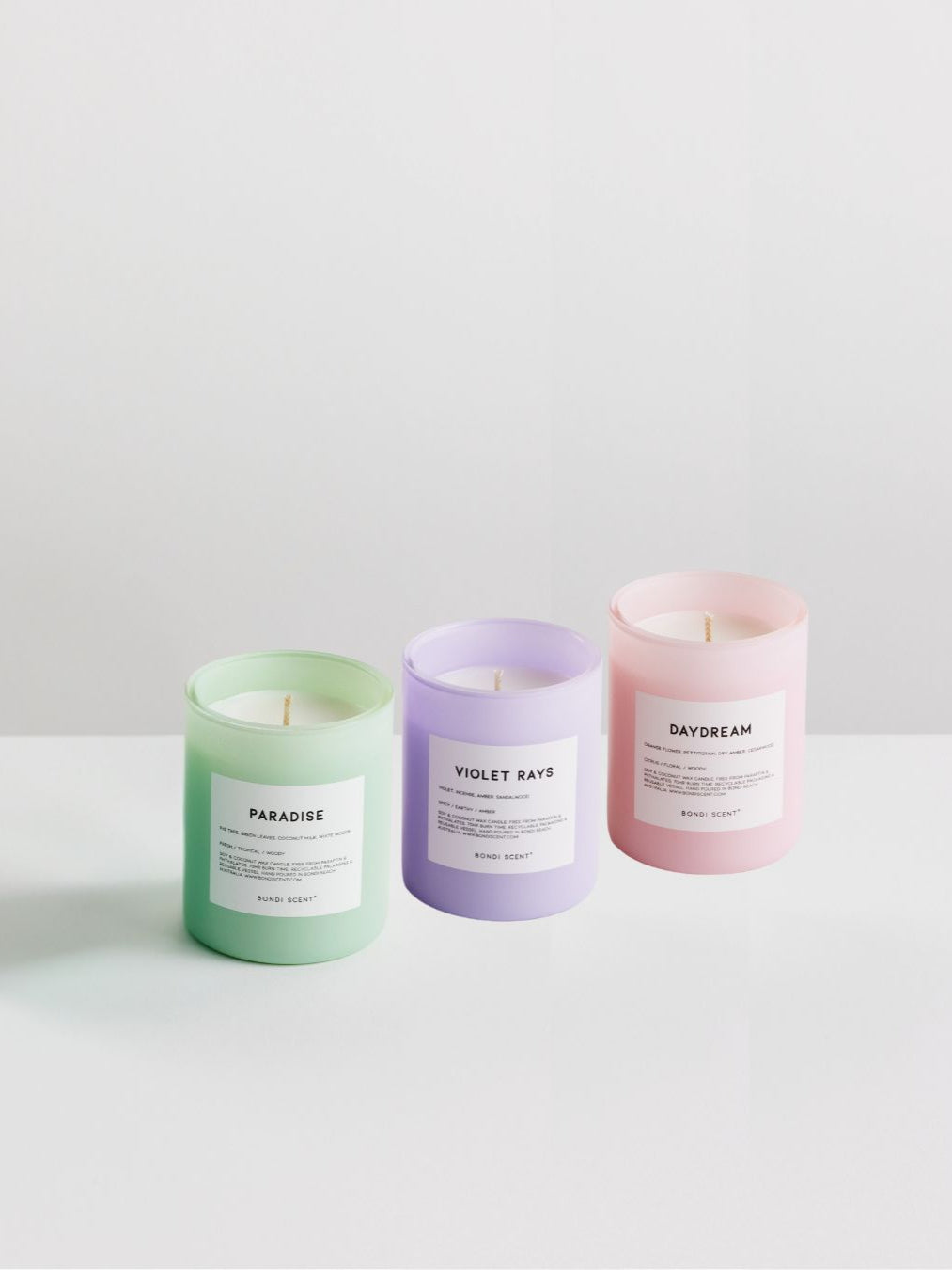 Bondi Scent Dopamine Trio scented candle set in glass jars on white background
