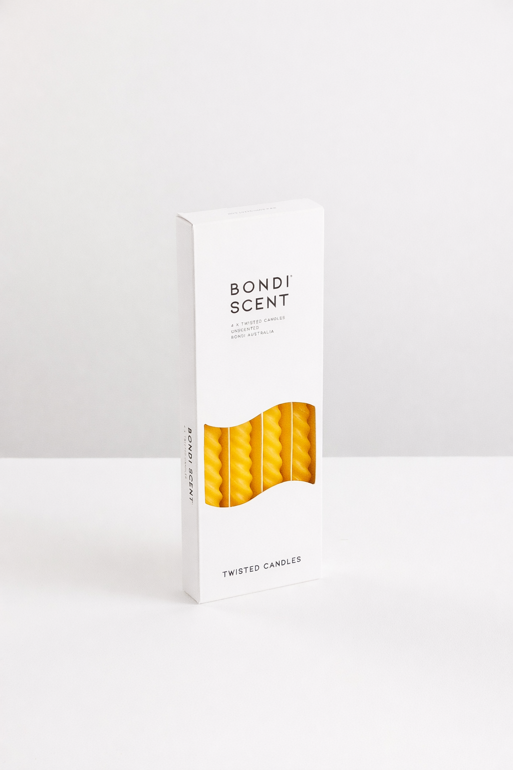 Bondi Scent sun twisted dinner candles in white packaging box on white background