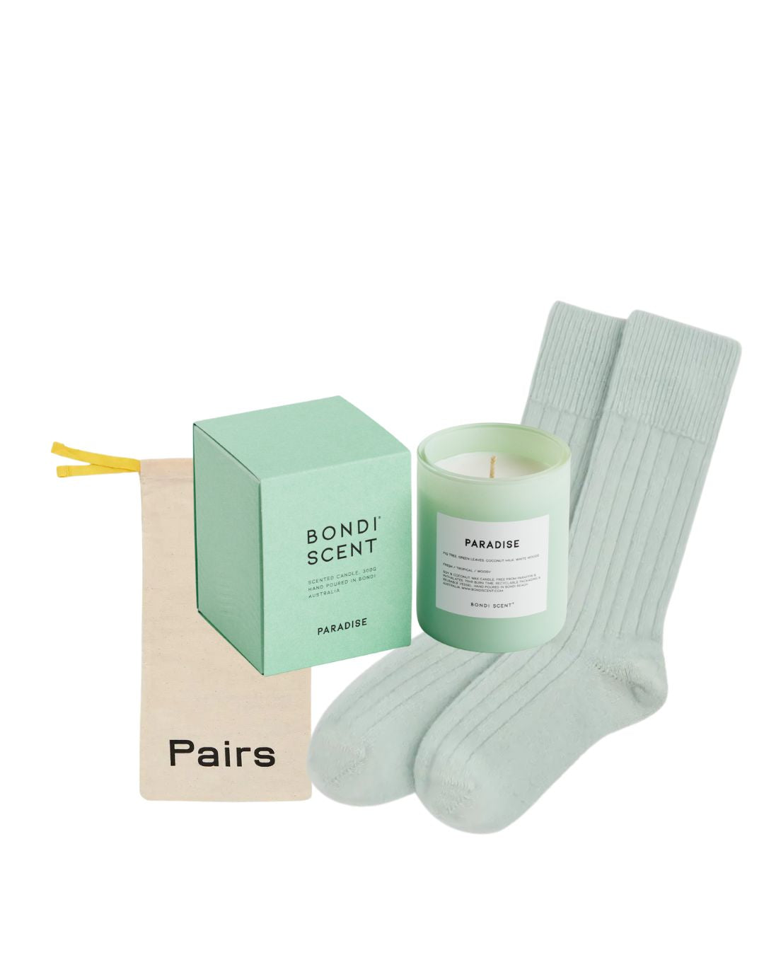 Mint green socks and candle with &