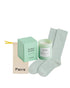Mint green socks and candle with &