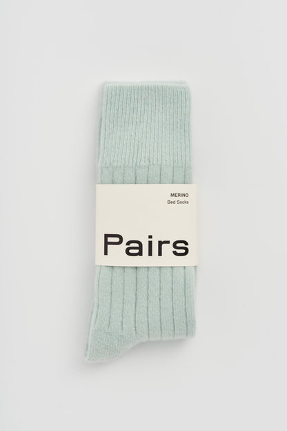 Pack of light green socks with &