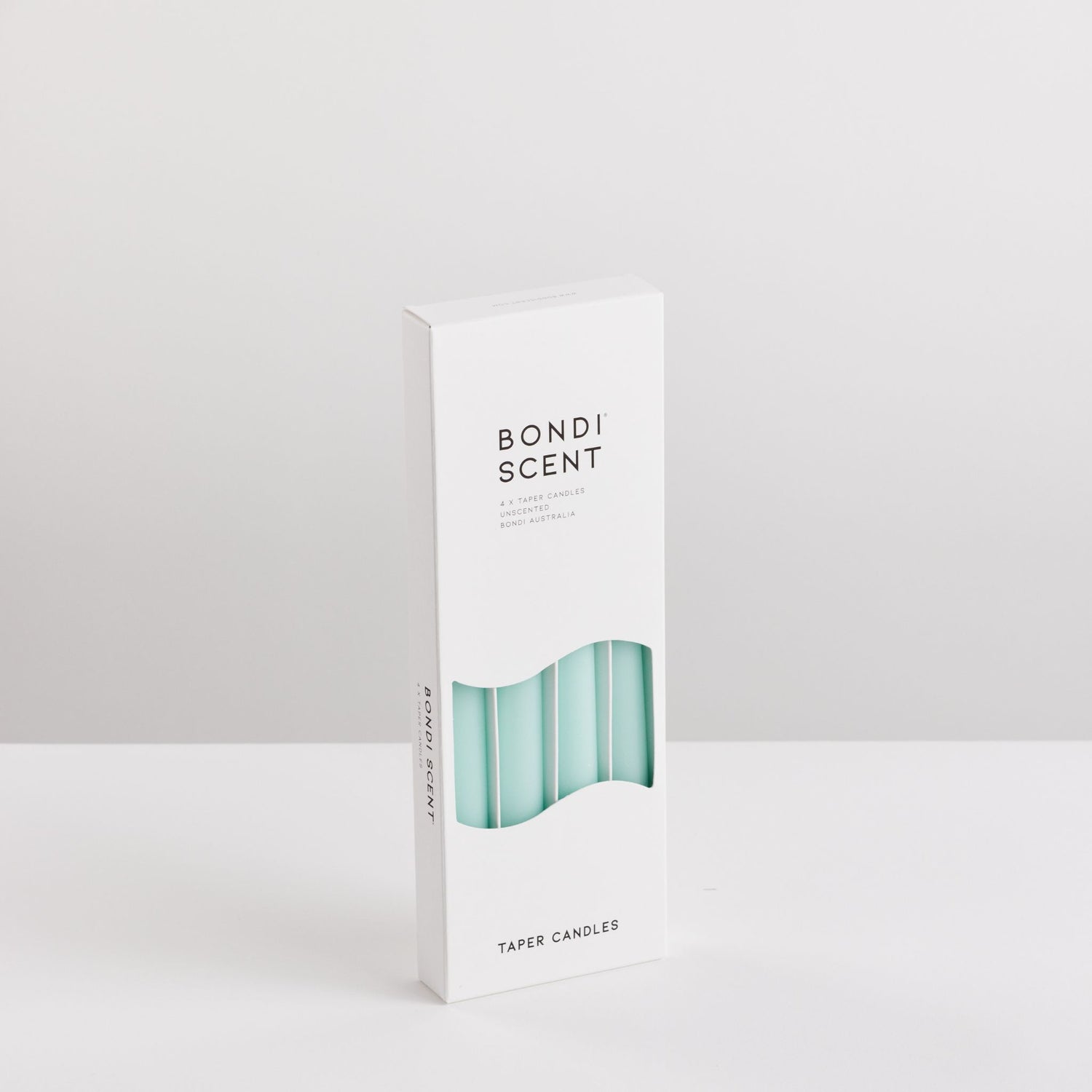 Bondi Scent mint taper dinner candles in packaging box on white background