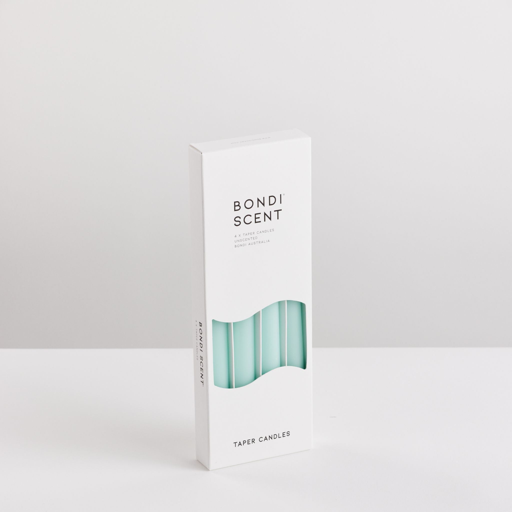 Bondi Scent mint taper dinner candles in packaging box on white background