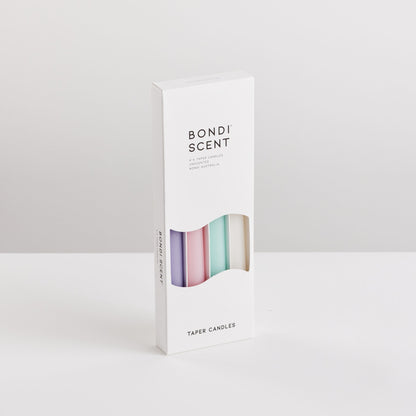 Bondi Scent multi colour taper candles in packaging box on white background