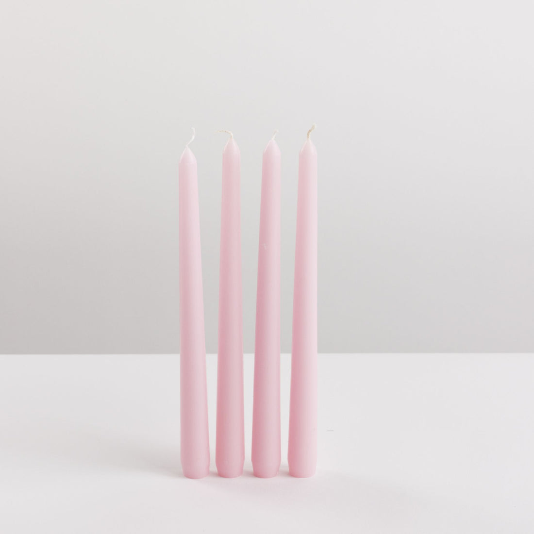 Bondi Scent violet taper candle dinner bundle on white background