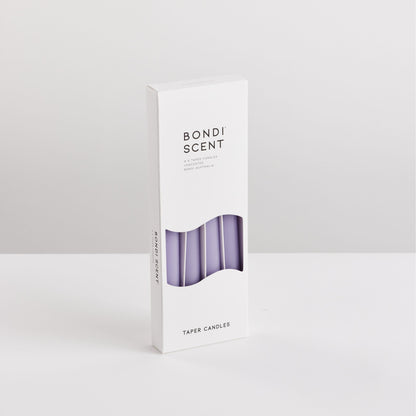 Bondi Scent violet taper dinner candles in packaging box on white background