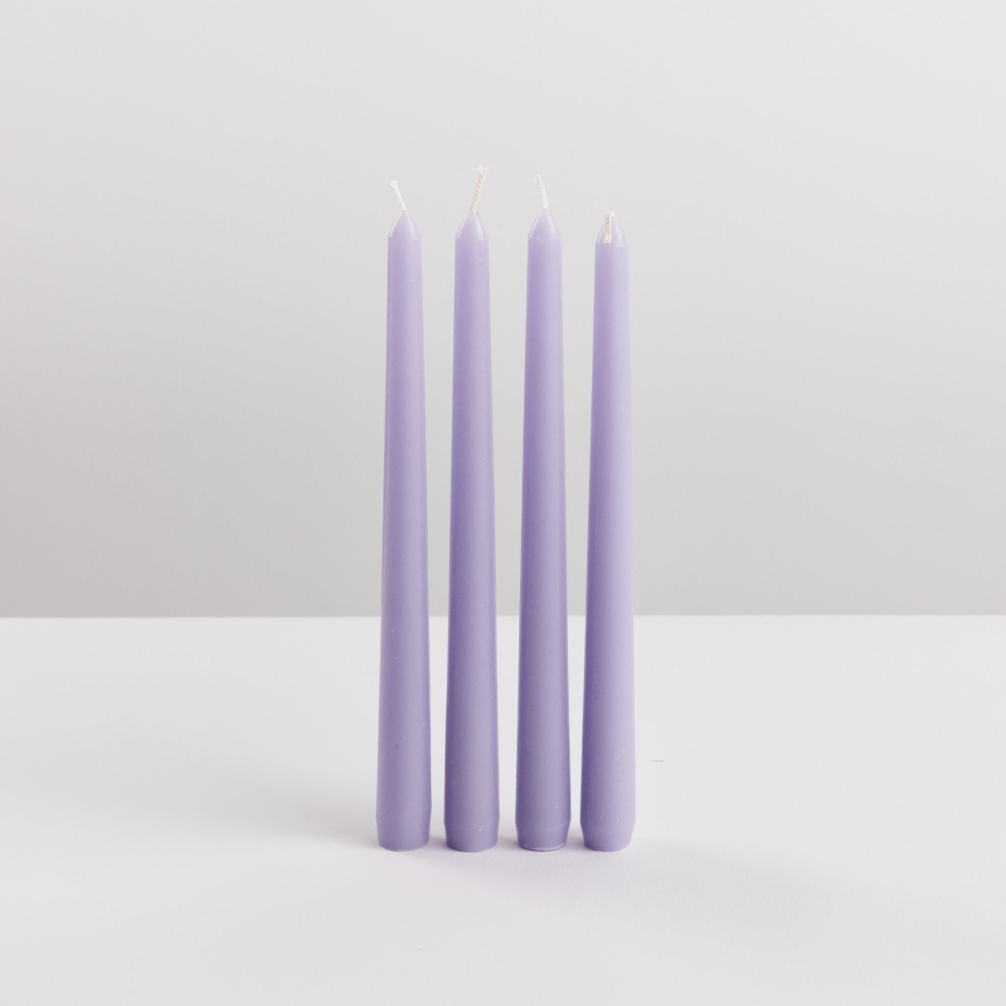 Bondi Scent violet taper dinner candle bundle on white background