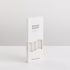 Bondi Scent white taper dinner candles in packaging box on white background
