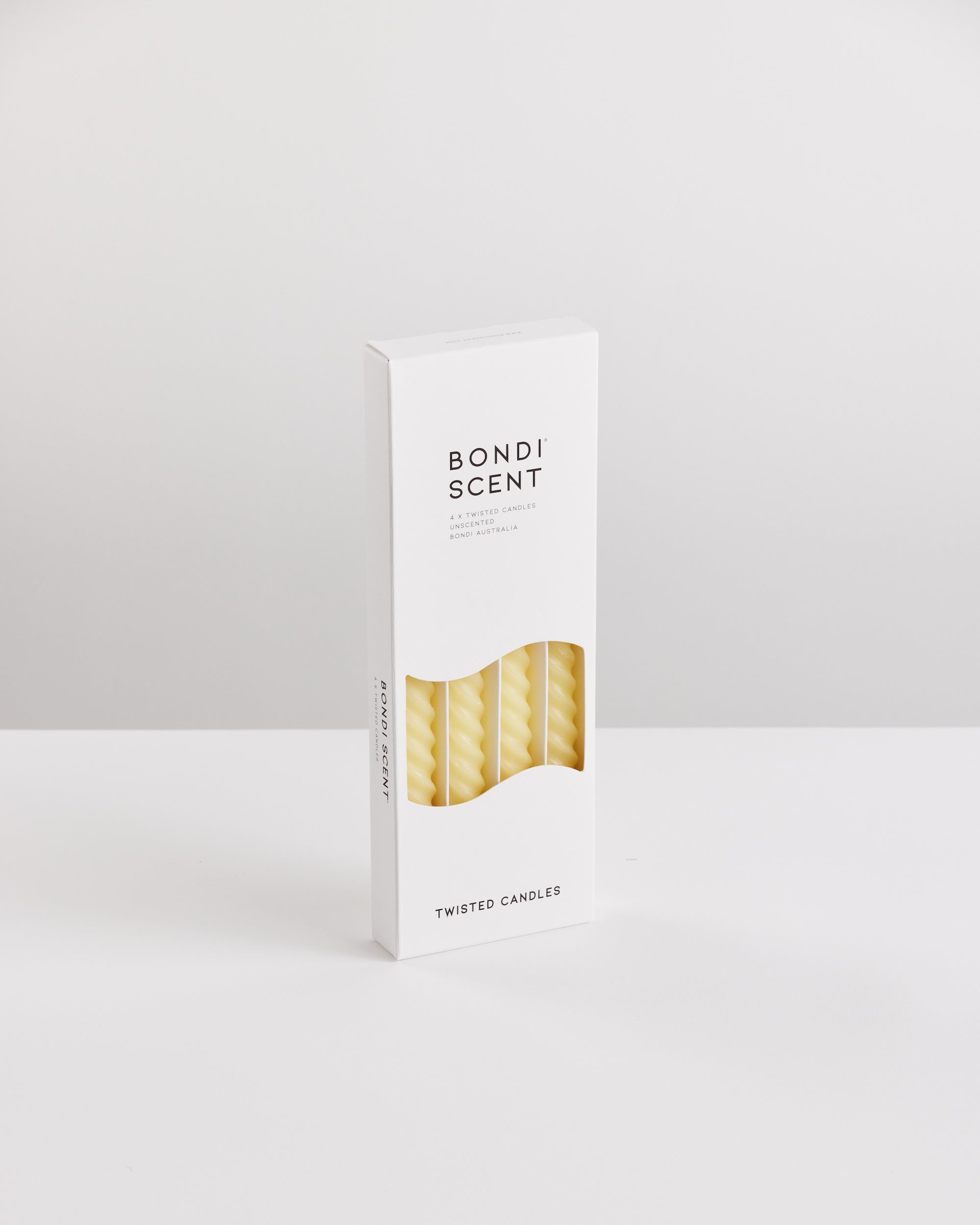 Bondi Scent lemon twisted dinner candles in white packaging box on white background