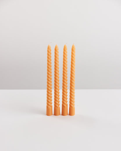 Bondi Scent orange twisted dinner candle bundle on white background